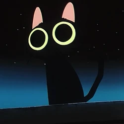 Nate’s avatar: a black cat with big glowing eyes